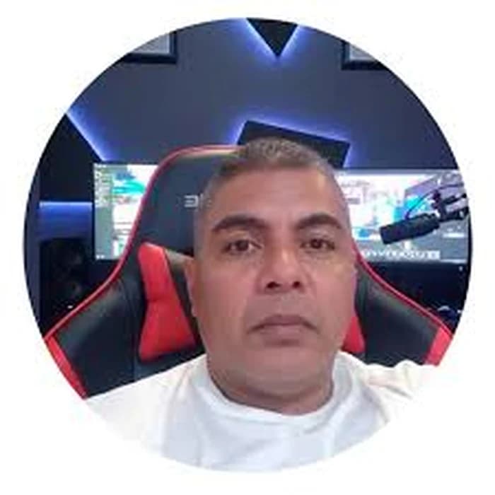 DJ Grego, discjockey, broadcaster and founder of Minitecas TV — present-day portrait in his studio, in front of a game console DJ Grego, discjockey, broadcaster and founder of Minitecas TV — present-day portrait in his studio, in front of a game console