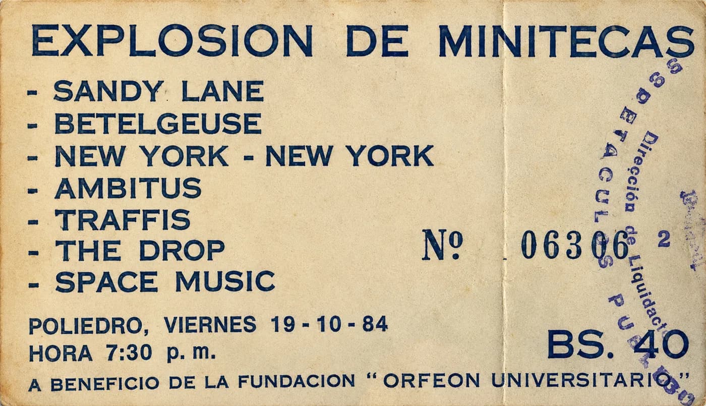 Entrada general original de la «Explosión de Minitecas» — Poliedro de Caracas, viernes 19 de octubre de 1984, 7:30 p.m., Bs. 40, N.º 06306, a beneficio de la Fundación «Orfeón Universitario»; con el cartel de las siete minitecas participantes Entrada general original de la «Explosión de Minitecas» — Poliedro de Caracas, viernes 19 de octubre de 1984, 7:30 p.m., Bs. 40, N.º 06306, a beneficio de la Fundación «Orfeón Universitario»; con el cartel de las siete minitecas participantes